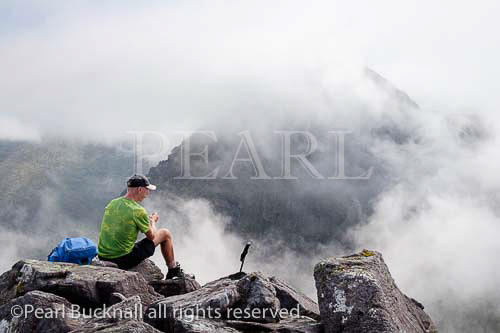 Hiker on Beenkeragh with view to Carrauntoohil in 
MacGillycuddy Reeks, Killarney, County Kerry, Eire, 
Southern Ireland, Europe