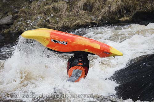 Kayaking in whitewater on the Tryweryn River at the 
National Whitewater Centre, Frongoch, Gwynedd, 
North Wales, UK, Europe. 

Keyword: kayak white water canoe canoeing 