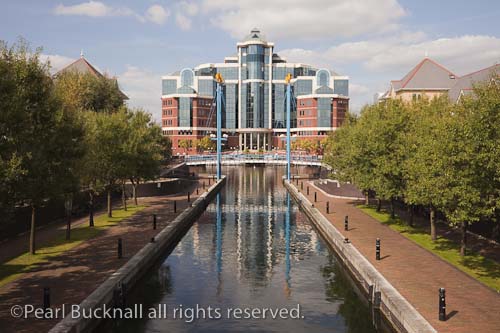 Victoria Harbour building along Mariner's Canal. 
Salford Quays, Greater Manchester, England, UK

Keywords: architecture building canal city urban