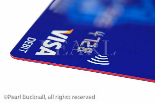 Visa debit card using contactless technology. 
England, UK, Britain, Europe