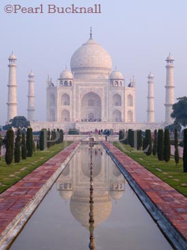 17th century Taj Mahal mausoleum in early morning 
light with reflection in water pool Agra Uttar Pradesh 
India Asia

Keywords: building historic reflection 
sightseeing tourism travel water
