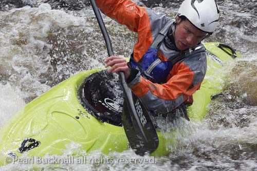 Kayaking in whitewater on the Tryweryn River at the 
National Whitewater Centre, Frongoch, Gwynedd, 
North Wales, UK, Europe. 

Keyword: kayak white water canoe canoeing 