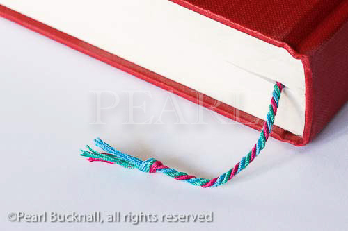 Bookmark marking a page in a book