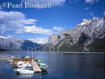 MOORED BOATS on LAKE MINNEWANKA in Banff 
National Park in the Rocky Mountains.  Banff, Alberta, 
Canada, North America

