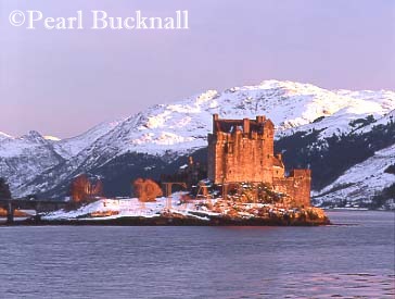 EILEAN DONAN CASTLE in WINTER with snow on the 
mountains round Loch Duich, Dornie, Highland, 
Scotland, UK, Europe

Keywords: coast coastline heritage historic landscape 
scenic Scottish sea snow winter 
