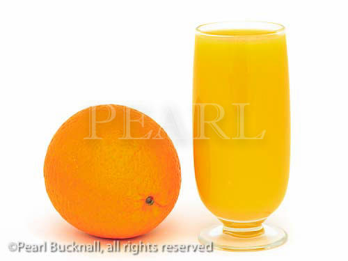 A glass of fresh orange juice with a whole orange fruit 
isolated on a white background