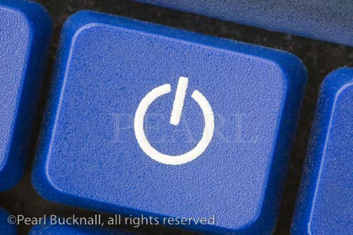 White power switch symbol on blue key

Keywords: electric still life