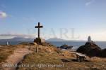 Llanddwyn Island cross and old lighthouse. 
Newborough Isle of Anglesey North Wales UK

Keywords: Ynys Mon coast scene