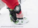 Skier adjusting alpine touring ski boots and wearing a 
Suunto Traverse GPS Watch for backcountry skiing 
navigation. Haute Savoie, Rhone-Alpes, France