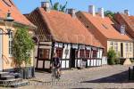 Quaint old Den Skæve bar (The Crooked Bar) in 
cobbled street of Overgade, Ebeltoft, Jutland, 
Denmark, Scandinavia, Europe