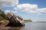 Traeth Dulas, Isle of Anglesey, North Wales, UK. Old 
wooden hull of a shipwreck in the bay

Keywords: coast scene scenic landscape historic ship 
wreck