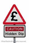 Triangular road sign warning Caution Hidden Dip 
with pound sign to illustrate financial future 
concept. UK, Britain, Europe