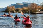 People canoeing in kayaks on Llyn Padarn Lake with 
Mount Snowdon in Snowdonia National Park. Llanberis, 
Gwynedd, North Wales, UK, Europe. 

Keywords: canoe boats water Welsh mountains Britain 
British