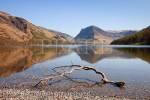 Scenic view to Fleetwith Pike reflected in Buttermere 
Lake in the Lake District National Park. Cumbria, 
England, UK, Europe. 

english scenic landscape britain british