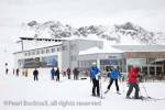 St Anton am Arleberg, Tyrol, Austria, Europe.  Skiers 
on piste by Galzig gondola summit station in Austrian 
Alps

Keywords: alpine skiing winter sports activity snow 
mountains people