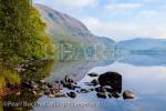 Still calm waters of Llyn Dinas lake on misty autumn 
morning in Nantgwynant valley in Snowdonia 
National Park. Beddgelert, Gwynedd, North Wales, 
UK, Britain, Europe.