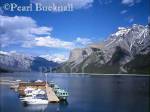 MOORED BOATS on LAKE MINNEWANKA in Banff 
National Park in the Rocky Mountains.  Banff, Alberta, 
Canada, North America

