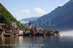 View across lake Hallstattersee to World Heritage 
lakeside town in the Austrian Alps. Hallstatt, 
Salzkammergut, Austria, Europe. 