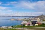 The old town and Colonial Harbour (Kolonihavnen) 
with Hans Egede House built 1728 oldest in the 
country and now venue for official government 
receptions. Hans Egede statue on hilltop beyond. 
Nuuk (Godthab), Sermersooq, Greenland