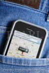 An Apple iPhone displaying Google maps for the 
London area in the back pocket of a pair of blue denim 
jeans. England, UK, Britain, Europe