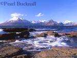 SNOW-CAPPED CUILLIN HILLS from across Loch 
Scavaig in winter.  Elgol, Isle of Skye, Highland 
Scotland, UK

Keywords: coast cold frozen icy landscape mountains 
picturesque remote scenic Scottish sea snow covered 
view water