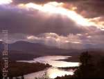 CREPUSCULAR RAYS and RAIN CLOUDS over LOCH 
GARRY. Glen Garry, Highland, Scotland, UK

Keywords: cloud lake mood rural sky water weather 
scenic
